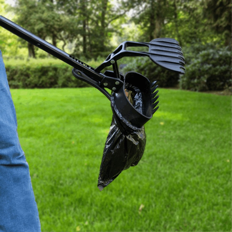 unlocked sweeping claw with teeth to flick waste into bag at bottom of simple scooper tool