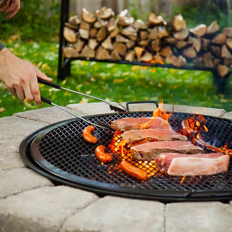 Grill hotdogs, steak, and more over a live burning fire using a sturdy mesh BBQ grilling grate.