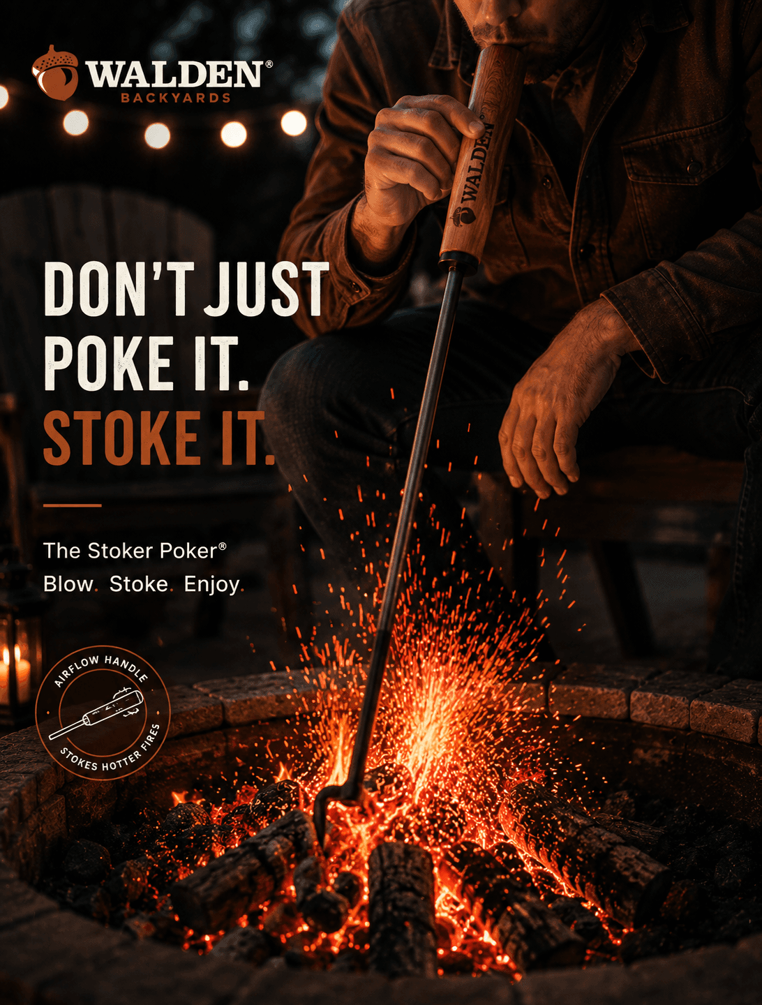 Sparks rising as a fire is stoked with a blow-through fire tool