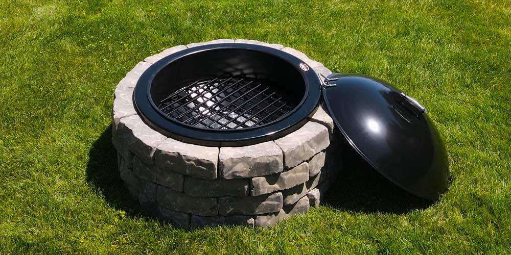 Well maintained and cleaned fire pit on grass