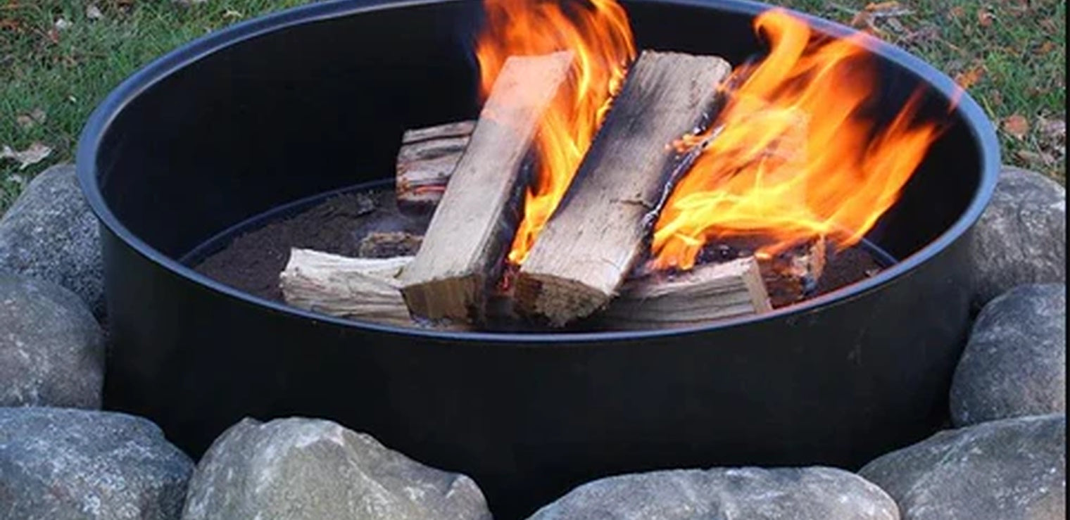 Round metal fire pit hi-res stock photography and images - Alamy