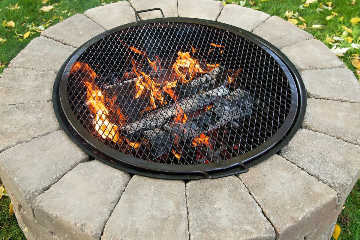 Why BBQ Over a Fire Pit in Your Backyard?