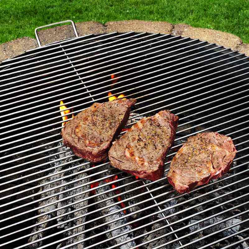 Create fire-grilled delicacies. Cooked steaks over the fire pit on the stainless steel rod grilling grate.