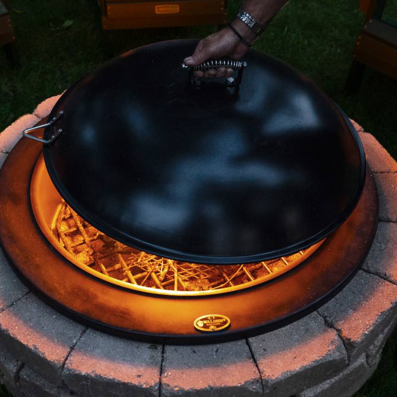 Walden snuffer lid fire pit cover fits perfectly over fire pit ring to put out the fire