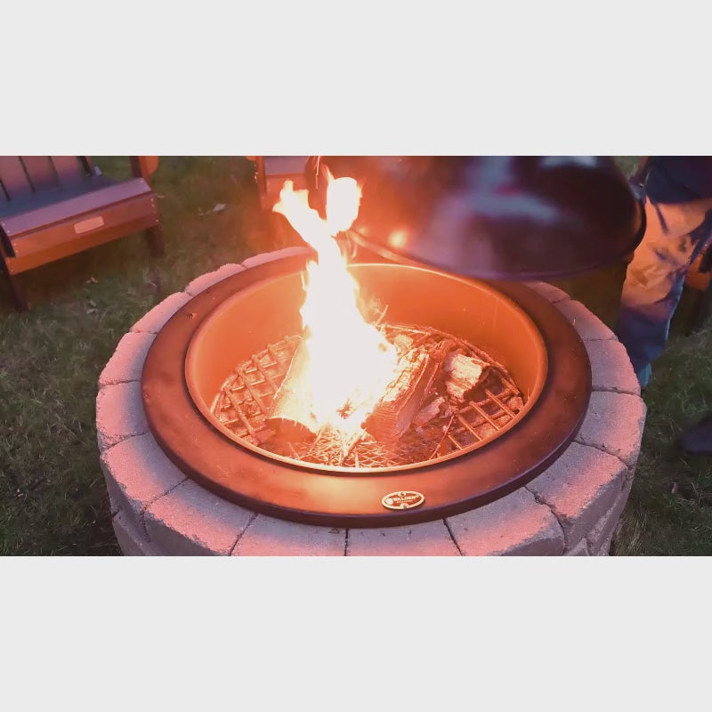 Snuffer Lid placed over roaring fire to put out flames
