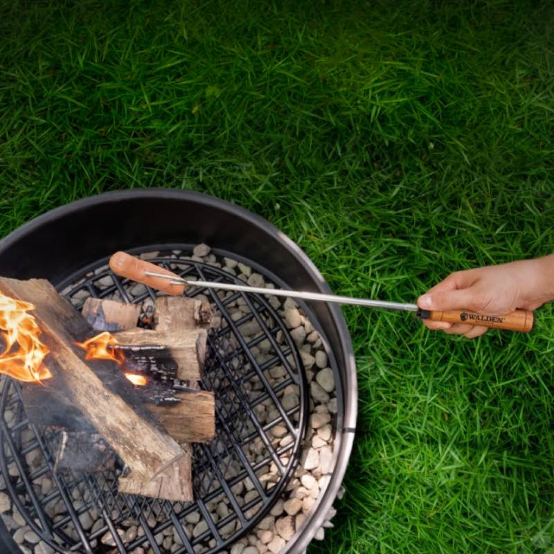 place ember catcher over a fire pit grate to make a hot fire for roasting hotdogs
